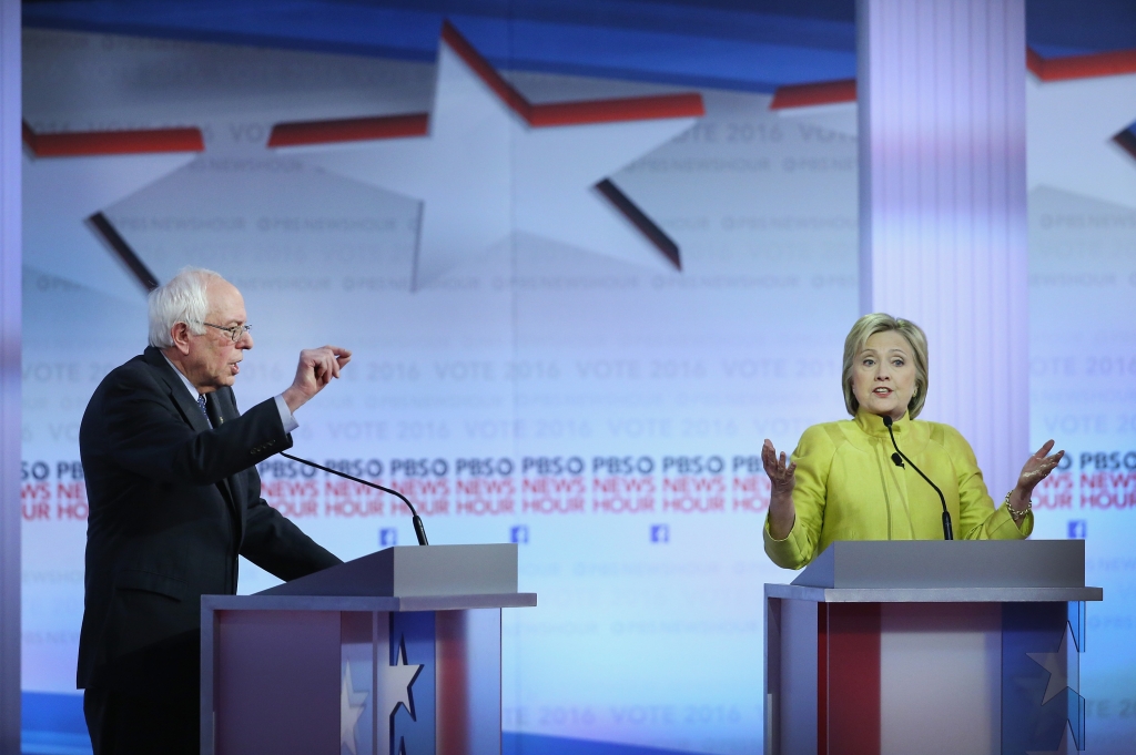 AP FACT CHECK: Clinton, Sanders on health care, donors