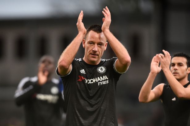 John Terry applauds fans at the end of the match