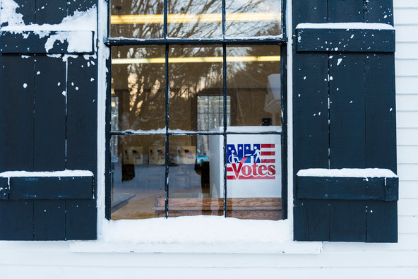 Voters dealt with the aftermath of Monday’s snowfall to cast their ballots in Madbury N.H. on Primary Day