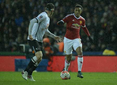 Derby’s English-born Irish defender Richard Keogh vies with Manchester United’s French striker Anthony Martial during the FA cup fourth round football match between Derby County and Manchester United at Pride Park stadium in Derby on Saturday