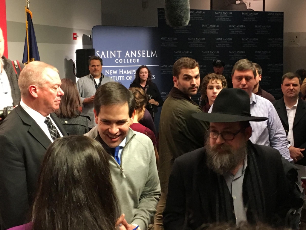 Rubio talks with supporters Thursday at St. Anslem College in New Hampshire