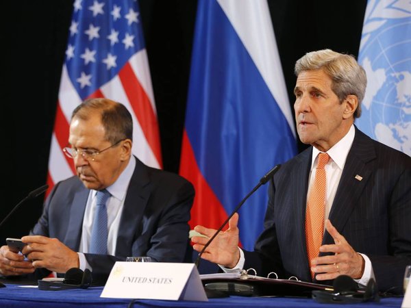 U.S. Secretary of State John Kerry right and Russian Foreign Minister Sergey Lavrov attend a news conference after the International Syria Support Group meeting in Munich Germany Friday Feb. 12 2016. Talks aimed at narrowing differences over