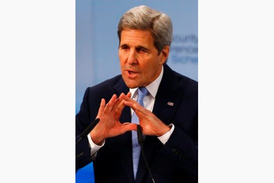 U.S. Secretary of State John Kerry gestures during his speech at the Security Conference in Munich Germany Saturday Feb. 13 2016