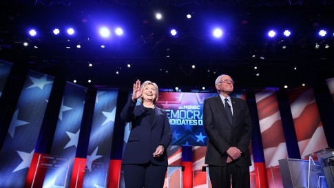 Democratic presidential candidate former Secretary of State Hillary Clinton and U.S. Sen. Bernie Sanders I-Vt. stand next to each before their debate in Durham N.H. The debate was sponsored by MSNBC