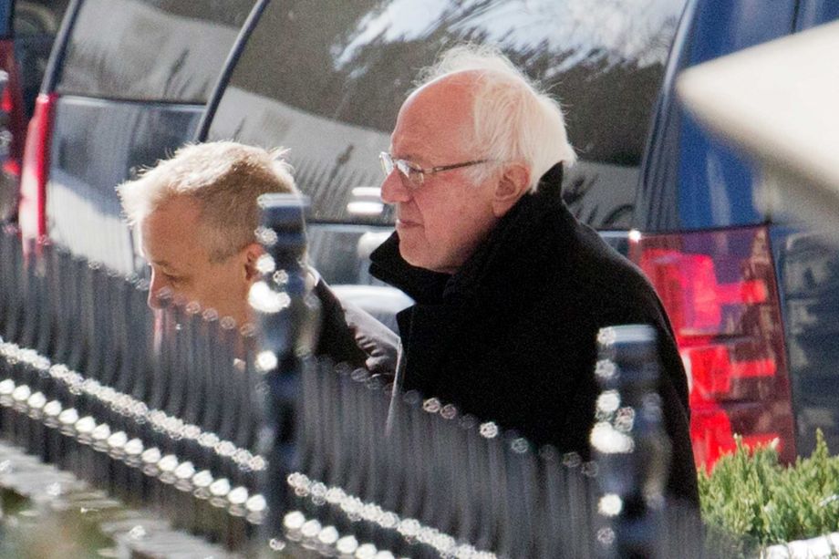 Democratic presidential candidate Sen. Bernie Sanders I-Vt. right arrives at the White House in Washington Wednesday Jan. 27 2016 for a meeting with President Barack Obama