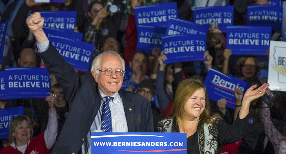 Democratic presidential candidate Bernie Sanders arrives for his caucus night rally in Des Moines Iowa