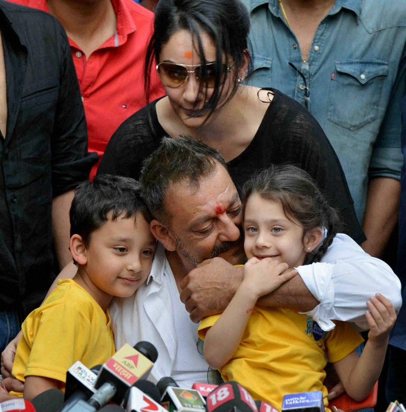 Mumbai Actor Sanjay Dutt with his wife Manyata and children Shahran and Iqra in a press conference at his residence in Mumbai on Thursday. Dutt walked free Thursday after completing his five-year prison sentence for illegal weapons possession in a case