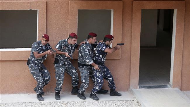 Lebanese Internal Security Forces demonstrate their skills at the forces simulation training village during their inauguration ceremony in the town of Aramoun south of the capital Beirut