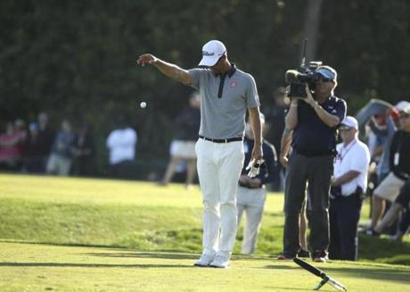 Adam Scott of Australia takes his second drop after hitting into the water for the second time on the 15th hole during the third round of the Honda Classic golf tournament Saturday Feb. 27 2016 in Palm Beach Gardens Fla