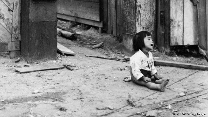 1950 crying in the streets of Inchon South Korea during the the Korean War 1950-1953