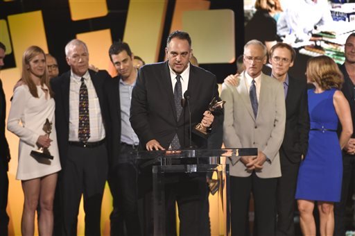 Michael Sugar center and the cast and crew of “Spotlight” accept the award for best feature at the Film Independent Spirit Awards on Saturday Feb. 27 2016 in Santa Monica Calif