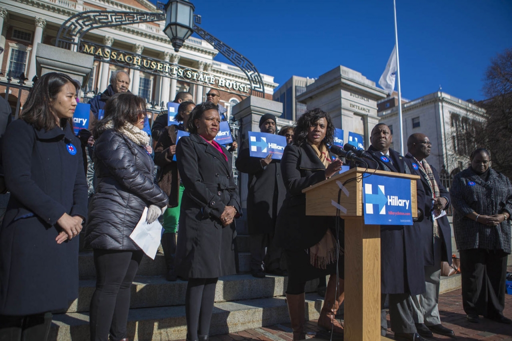 Surrounded by other minority leaders Boston City Councilor Ayanna Pressley speaks at a State House rally Wednesday for Democratic presidential candidate Hillary Clinton