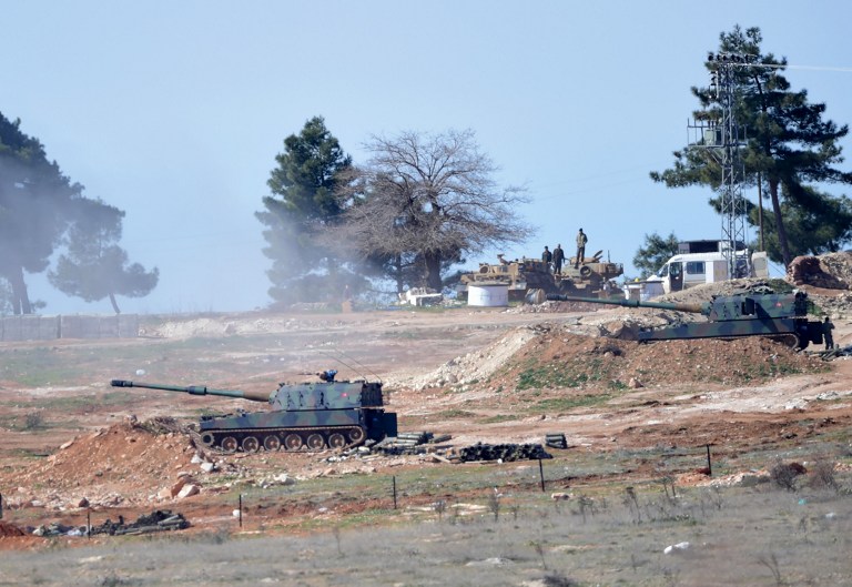 Tanks stationed at a Turkish army position near the Oncupinar crossing gate close to the town of Kilis south central Turkey fire towards the Syria border