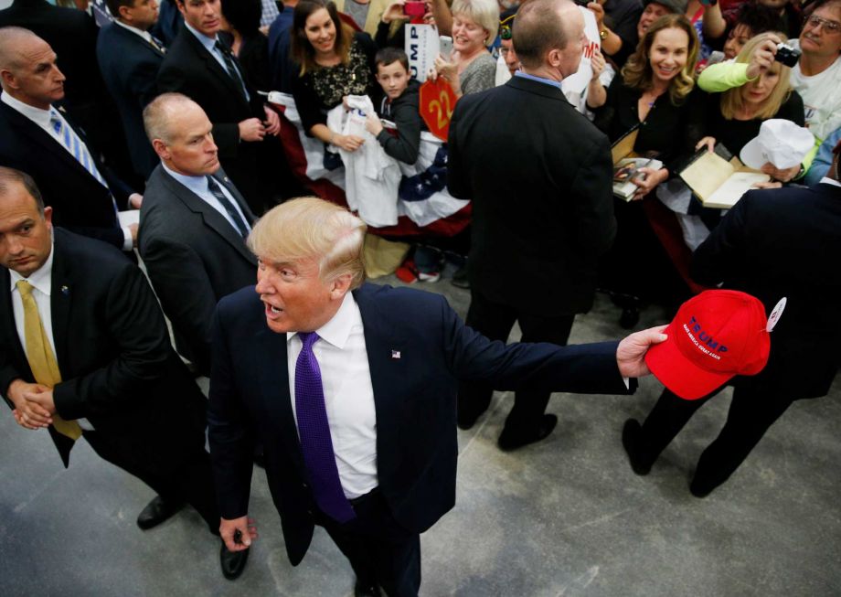 Republican presidential candidate Donald Trump reacts while meeting with supporters at a campaign rally Monday Feb. 22 2016 in Las Vegas