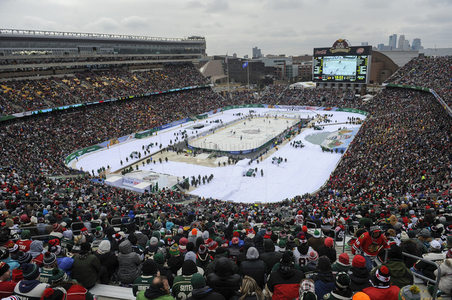 Fans watch the Minnesota Wild play Chicago Blackhawks at TCF Bank Stadium during an NHL Stadium Series hockey game Sunday Feb. 21 2016 in Minneapolis. The