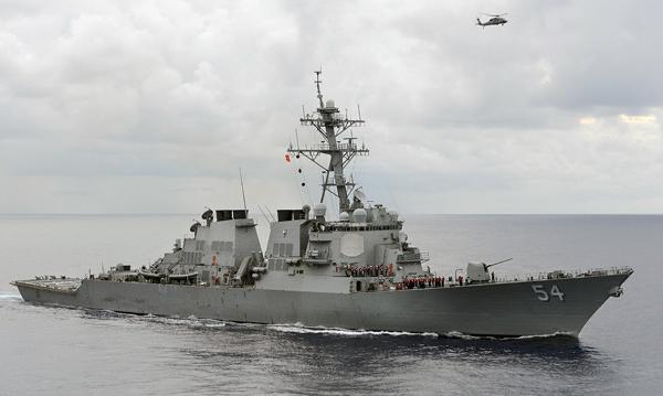 The US navy guided-missile destroyer USS Curtis Wilbur patrols in the Philippine Sea