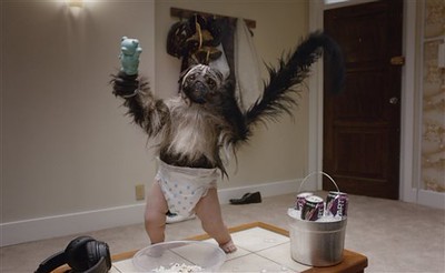 This image provided by Mountain Dew shows a “Puppymonkeybaby” in a scene from the company's Kickstart spot for Super Bowl 50