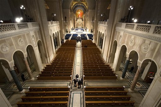 Ushers get ready for a funeral mass for the late Supreme Court Associate Justice Antonin Scalia at the Basilica of the National Shrine of the Immaculate Conception in Washington Saturday Feb. 20 2016