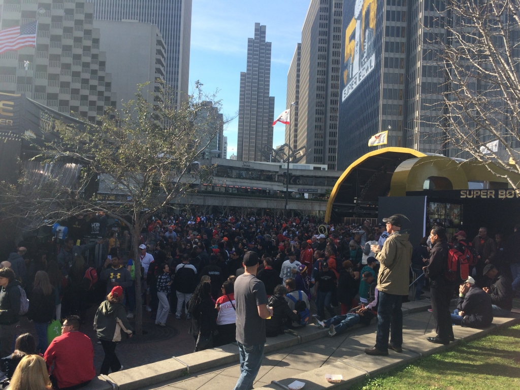 Thousands of fans poured into Super Bowl City today eager to cheer on their teams