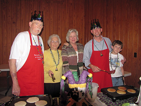 Trinity parishioners at a previous Shrove Tuesday Pancake Supper from left Ceres Rodgers Emilie Biggs Steve and Parker Reynolds