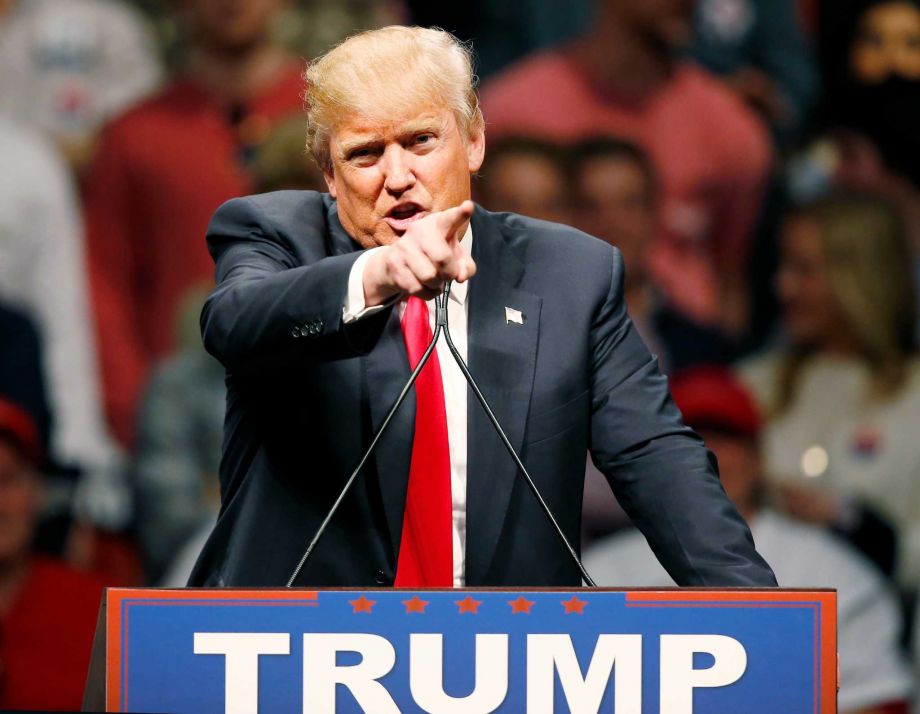 Republican presidential candidate Donald Trump gestures during a speech to a rally in Oklahoma City Friday Feb. 26 2016