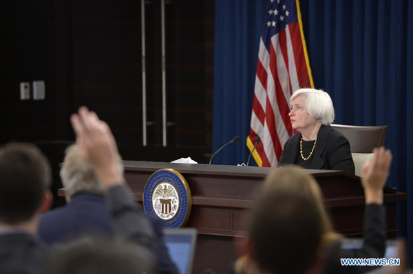 Fed keeps interest rates steady closely watching global markets