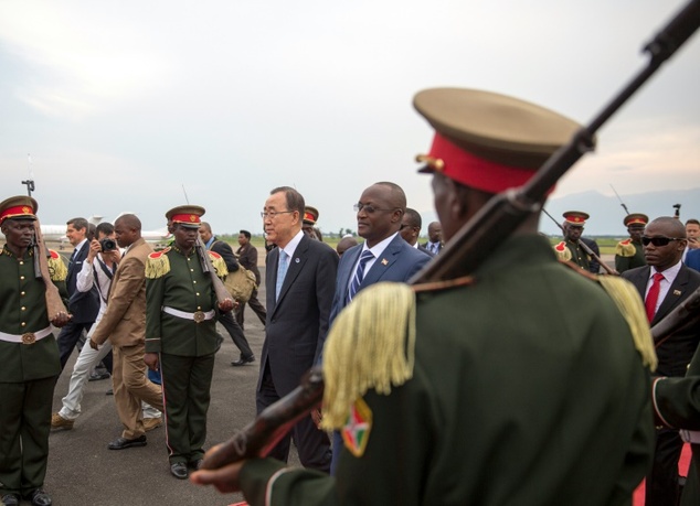 United Nations Secretary General Ban Ki Moon walks with Burundi's Vice President Gaston Sindimwo at Bujumbura airport