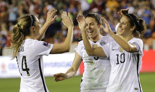 United States Carli Lloyd celebrates with Kelley Oï¿½Hara center and Morgan Brian after scoring a goal against Trinidad and Tobago during the first half of a CONCACAF Olympic women's soccer qualifying championship semifinal Friday Feb. 19