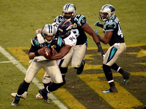 Cam Newton of the Carolina Panthers gets sacked by De Marcus Ware of the Denver Broncos in the second quarter. The Denver Broncos played the Carolina Panthers in Super Bowl 50 at Levi's Stadium in Santa Clara