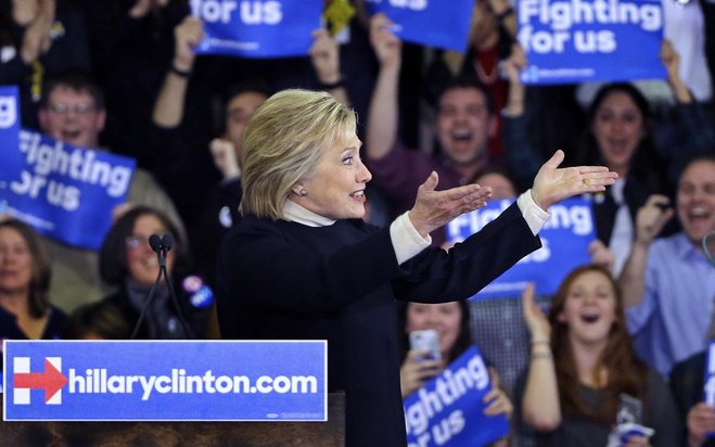 Democratic presidential candidate Hillary Clinton gestures to supporters at a New Hampshire presidential primary campaign rally on Tuesday