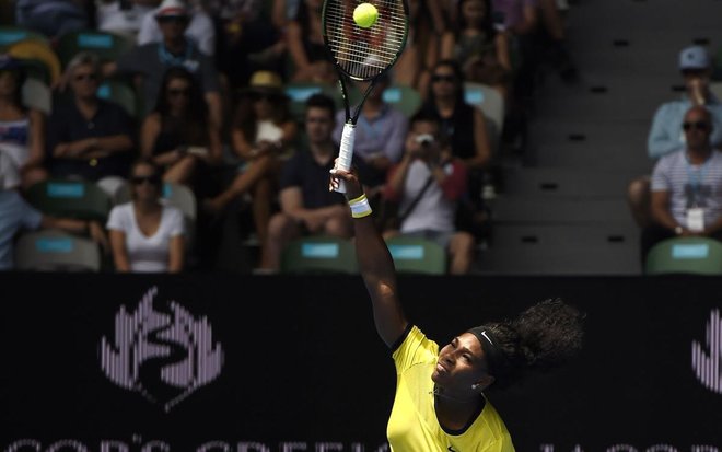 Serena Williams serves during her 6-4 6-1 victory over Maria Sharapova in their quarterfinal match on Tuesday in Melbourne Australia