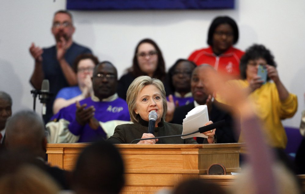 Democratic presidential candidate Hillary Clinton speaks at the House of Prayer Missionary Baptist Church on Sunday in Flint Mich