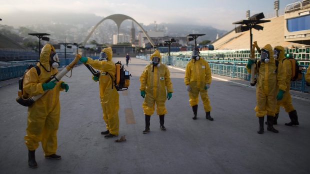 Workers spray Brazil stadium for mosquitoes