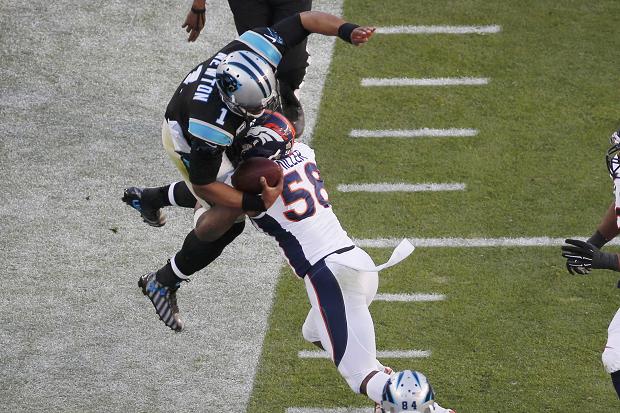 Carolina Panthers’ quarterback Cam Newton is knocked out of bounds by Denver Broncos’ Von Miller who was named MVP
Michael Fiala  Reuters