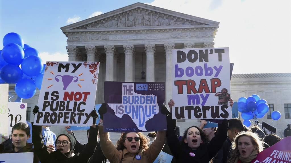 Abortion rights protesters rally outside the Supreme Court in Washington on Wednesday