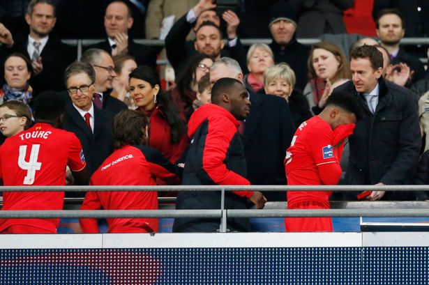 Liverpool players collect the runners up medals