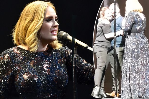 Adele pulled the couple up on stage following the proposal