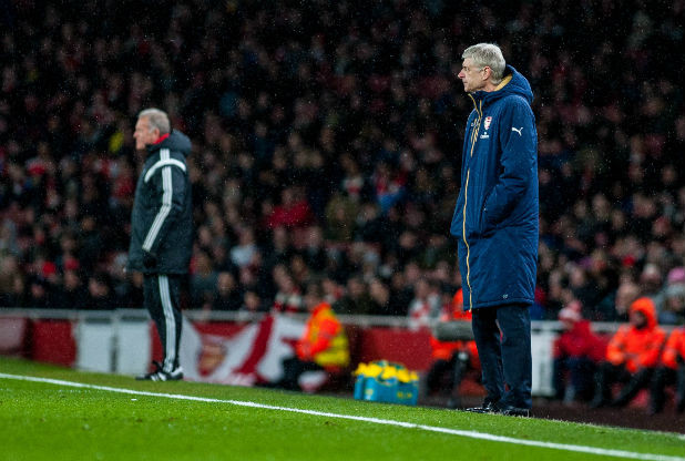 Arsene Wenger and Alan Curtis watch on as Swansea City claim yet another famous Emirates win