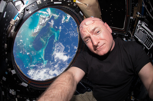 Expedition 44 flight engineer and NASA astronaut Scott Kelly is seen inside the Cupola a special module which provides a 360-degree viewing of the Earth and the International Space Station July