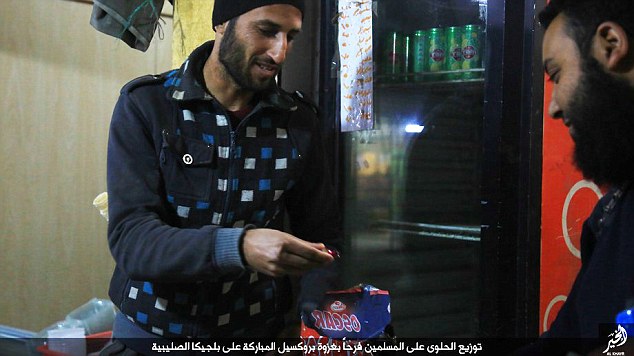 Bags of sweets and other items were handed by militants to young children and men in the province of Deir Ezzor eastern Syria