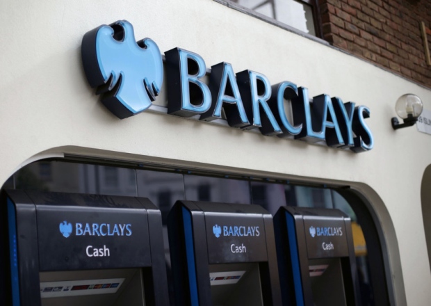 Barclays is to cut its dividend after reporting a fall in profits