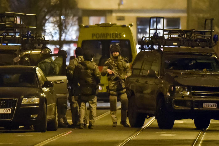 Brussels terror raid: police officers injured