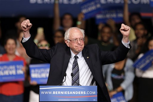 Democratic presidential candidate Sen. Bernie Sanders I-Vt. acknowledges his supporters on arrival at a campaign rally Tuesday