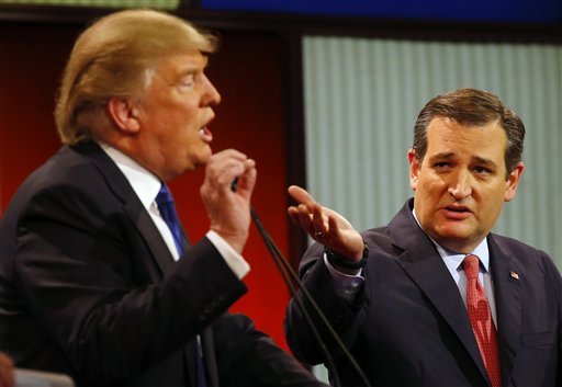 Republican presidential candidates businessman Donald Trump and Sen. Ted Cruz R-Texas argue a point during a Republican presidential primary debate at Fox Theatre Thursday