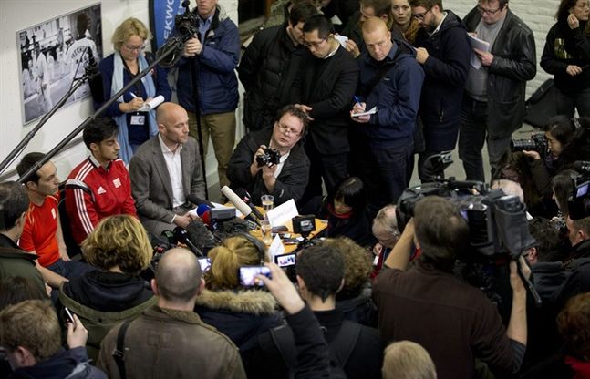 Mourad Laachraoui second left behind the table considered one of Belgium's big Taekwondo talents and brother of Najim Laachraoui and his lawyer Philippe Culot right listen to questions during a press conference in Brussels Belgium Thursday March