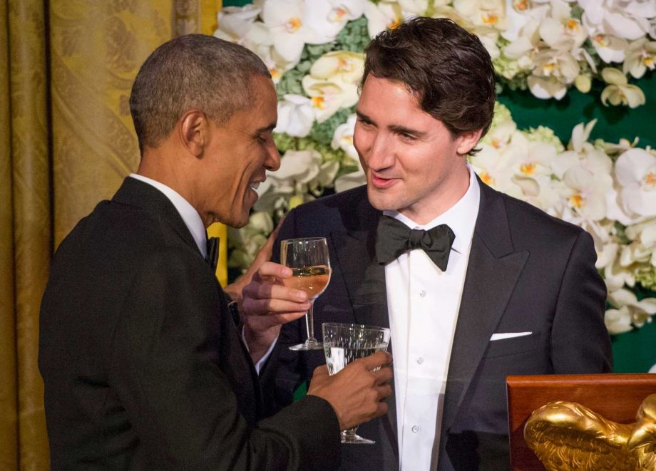 Canadian Prime Minister Justin Trudeau right proposes a toast to US President Barack Obama during a state dinner Thursday