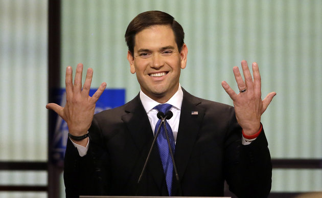 Carlos Osorio  Associated Press
Republican presidential candidate Marco Rubio shows off his hands suggesting something about the size of his jewels