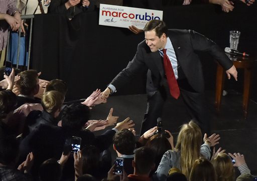 Presidential candidate Sen. Marco Rubio shakes hands during rally at U.S. Space & Rocket Center in Huntsville Ala. Saturday Feb. 27 2016