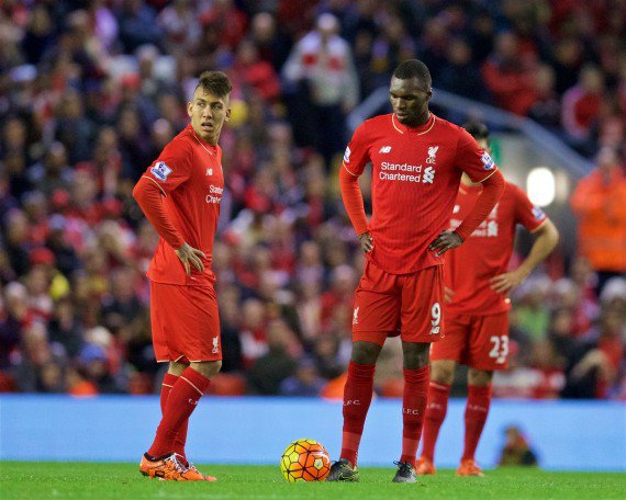 Liverpool's Roberto Firmino and Christian Benteke look dejected as his side concede a late equaliser to Southampton during the Premier League match at Anfield