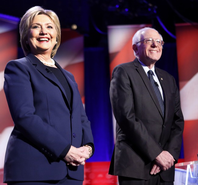 Democratic presidential candidates Hillary Clinton left and Sen. Bernie Sanders I-Vt pose for